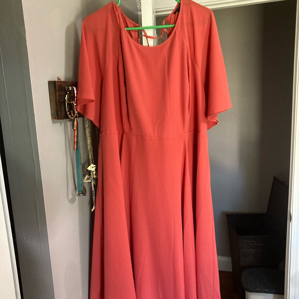 Knee length flowy peach dress